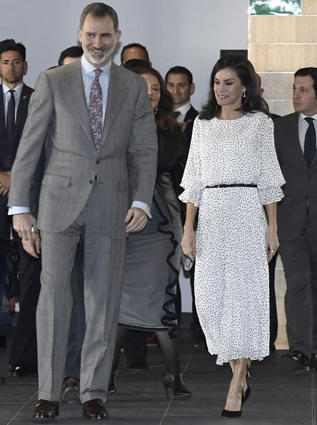 Queen Letizia wore Emporio Armani Crepon long dress with polka dot jacquard motif. Doñana Natural Park in Almonte