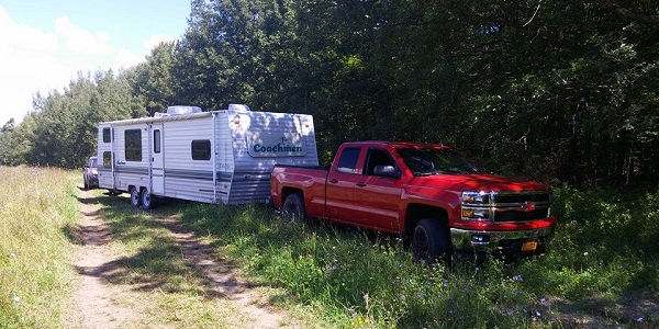 2016 Chevrolet Silverado red towing