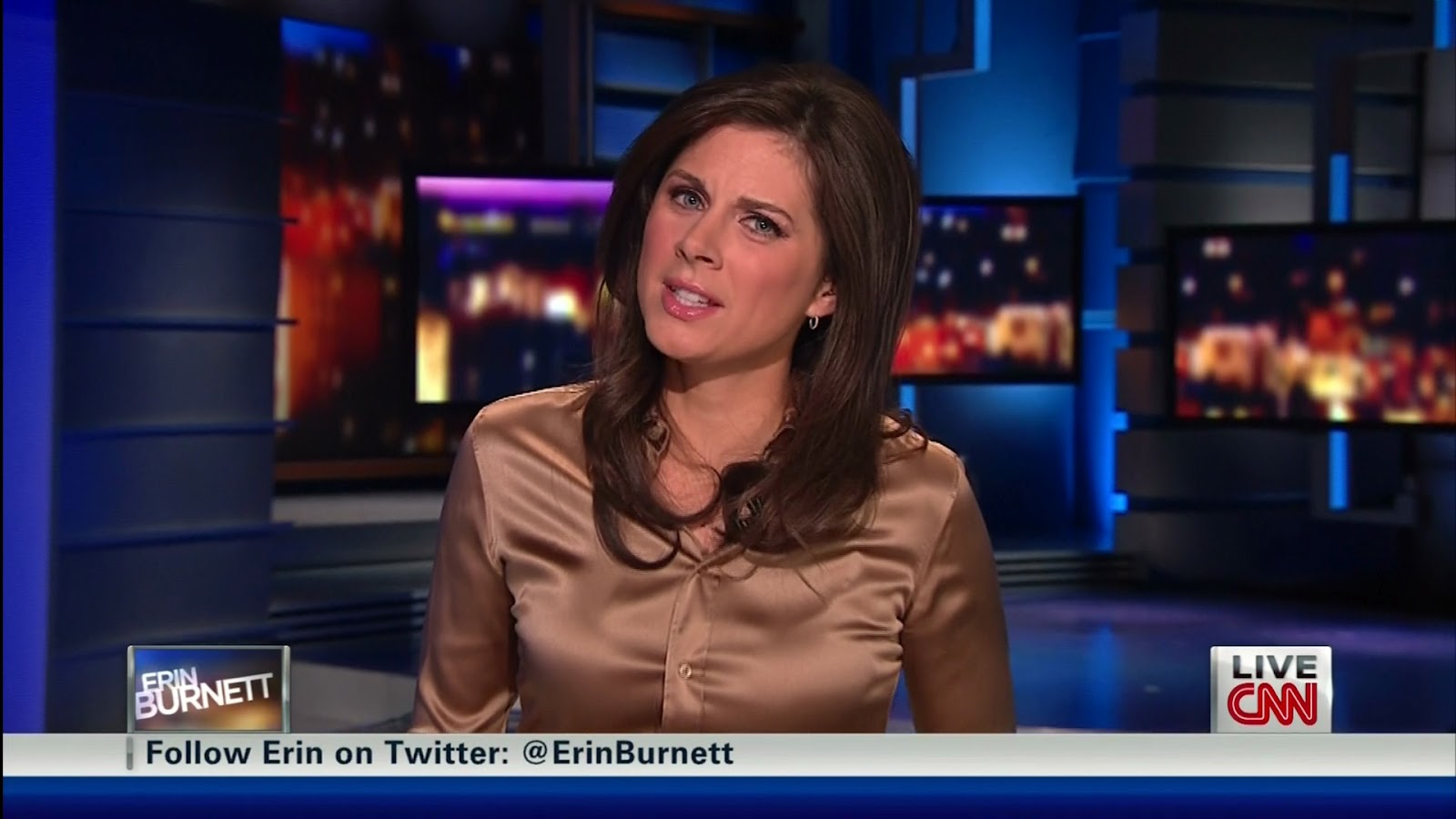 erin burnett - light brown satin blouse.