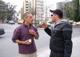 Two strangers having a conversation. Two strangers having a conversation.