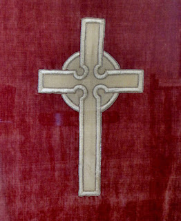 Cross on a banner