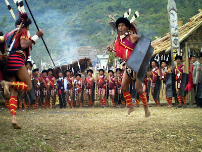 Naga dancers with spears and plumed headresses during the Horbill Festival.