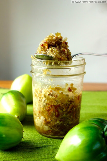 photo of a jar of green tomato bacon jam with green tomatoes