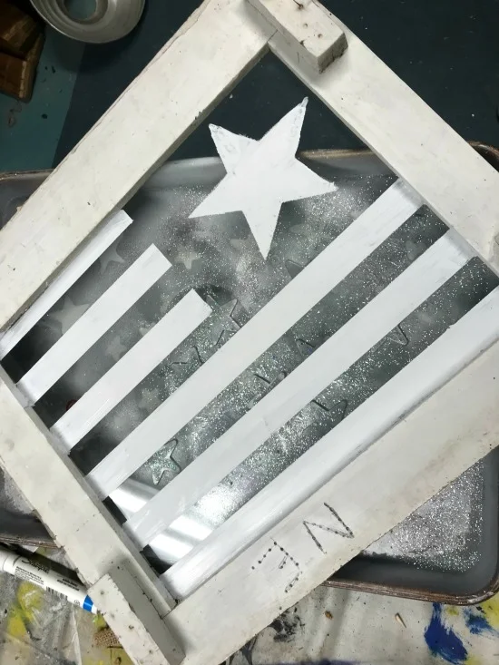 Painting a flag on a Chippy Window with white paint