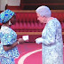 Nigerian lady, Bukola Bolarinwa, meets the Queen of England (Photos)