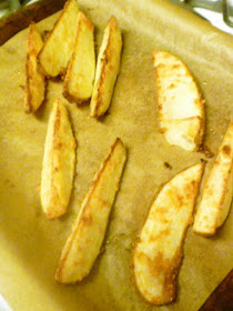 Crispy on the outside and tender on the inside with garlc and melted Parmesan all over the top!  HEAVEN  Savory Garlic Parmesan Potato Wedges - Slice of Southern
