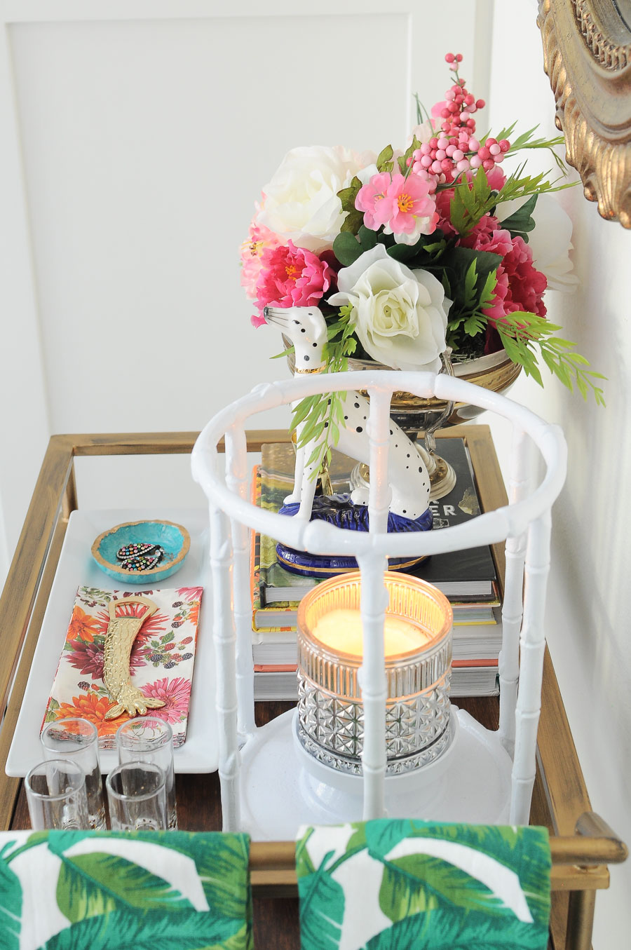 Spring bar cart decor styling ideas- florals, candles, liquor, and lots of chic and glam accents. Spring bar cart decor styling ideas- florals, candles, liquor, and lots of chic and glam accents.