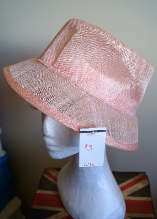 Before photo of pink sinamay hat