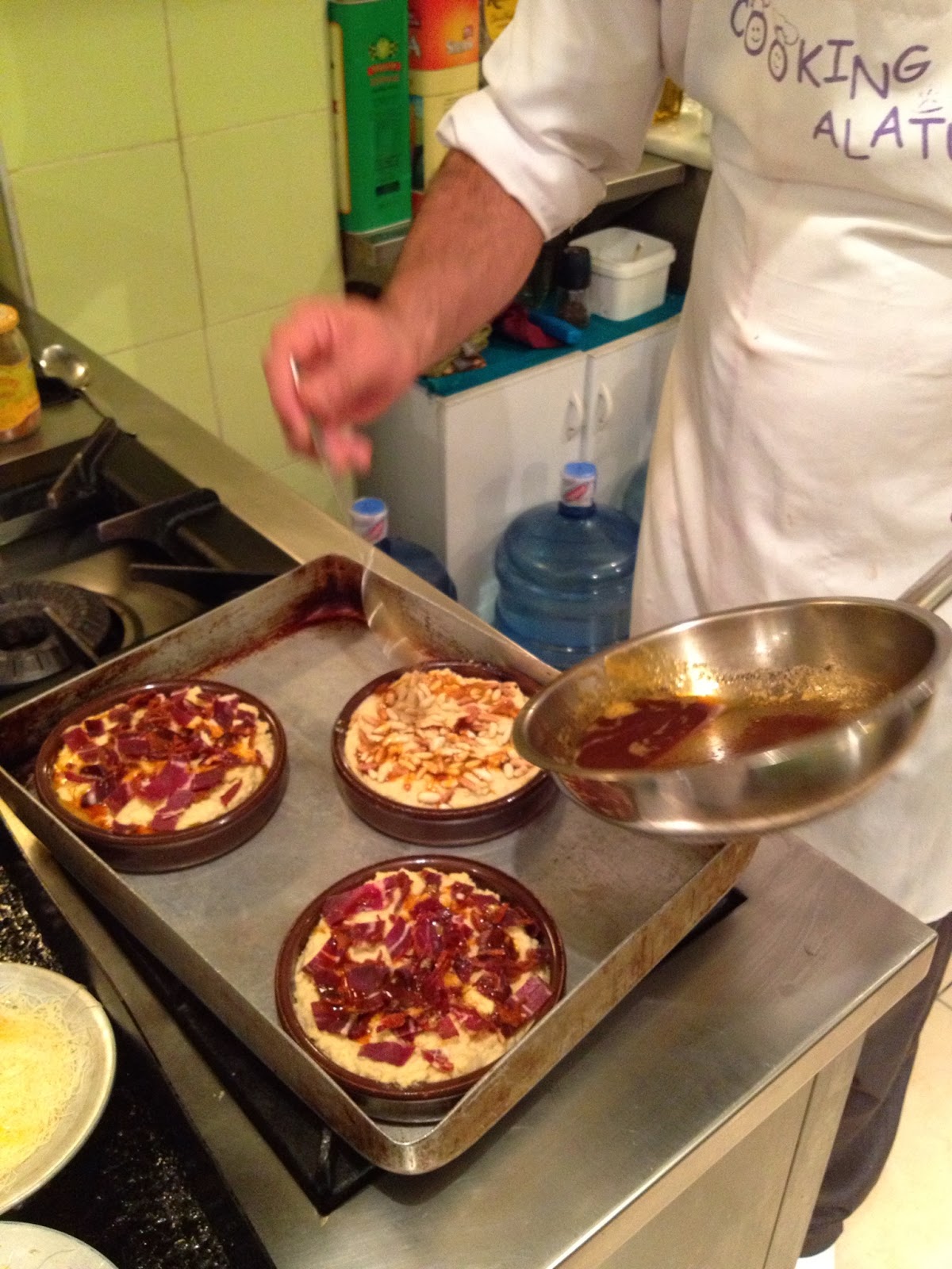 Istanbul - Topping off dishes of hummus