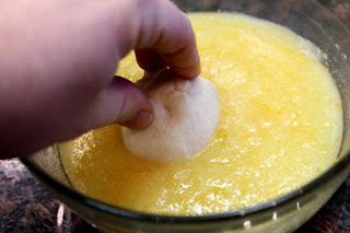 rolling-dough-in-orange-topping