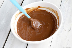 Chocolate and peanut butter for Valentines Day Cupid Chow recipe from Served Up With Love
