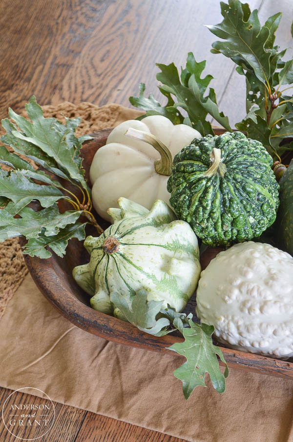 Green and white gourds, squash, pumpkins, and oak leaves...Great idea for a neutral fall decor.