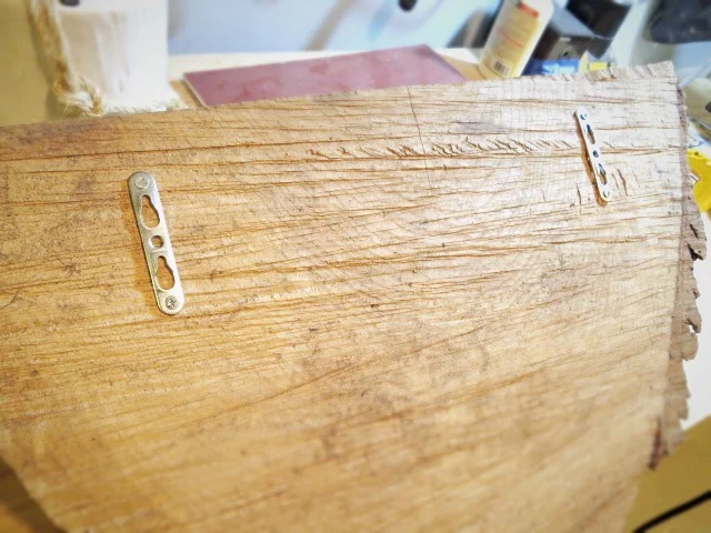 attached keyhole brackets to wood wedge