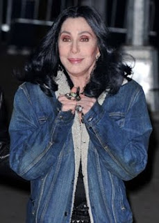 Cher in a denim jacket