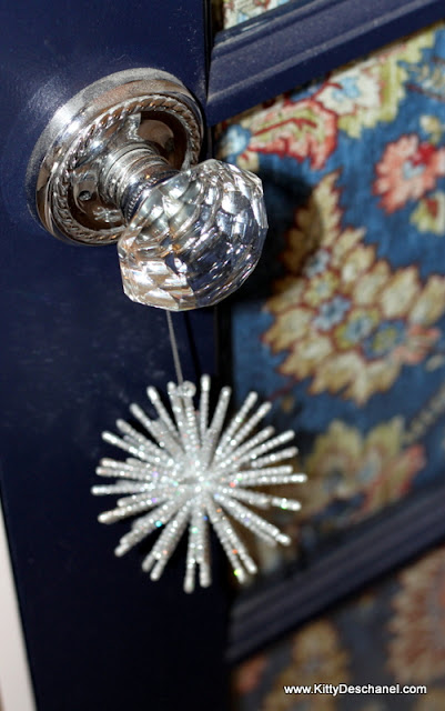 crystal doorknob and blue door