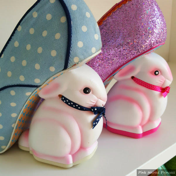 Irregular Choice Family Reunion Hunnie Bunnie heel comparison back view of old and new bunny heels on shelf
