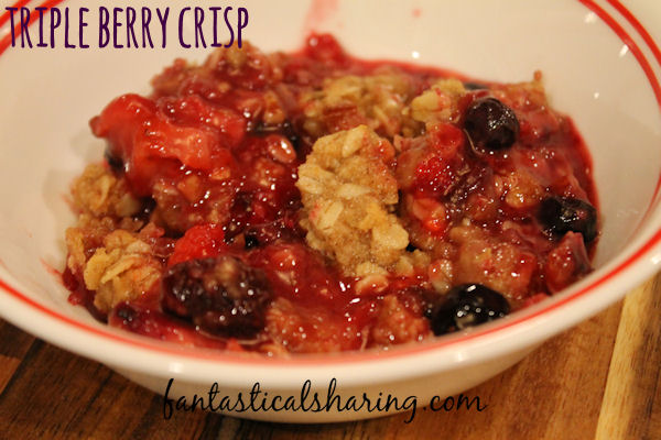 Triple Berry Crisp // This crisp is the perfect thing to whip up with berries with or without ice cream on top. #recipe #dessert #berry