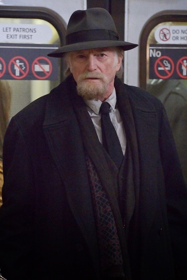 David Bradley as Jewish Holocaust survivor and pawn shop owner Abraham Setrakian in the train station in The Strain Season 1 Episode 8 Creatures of the Night