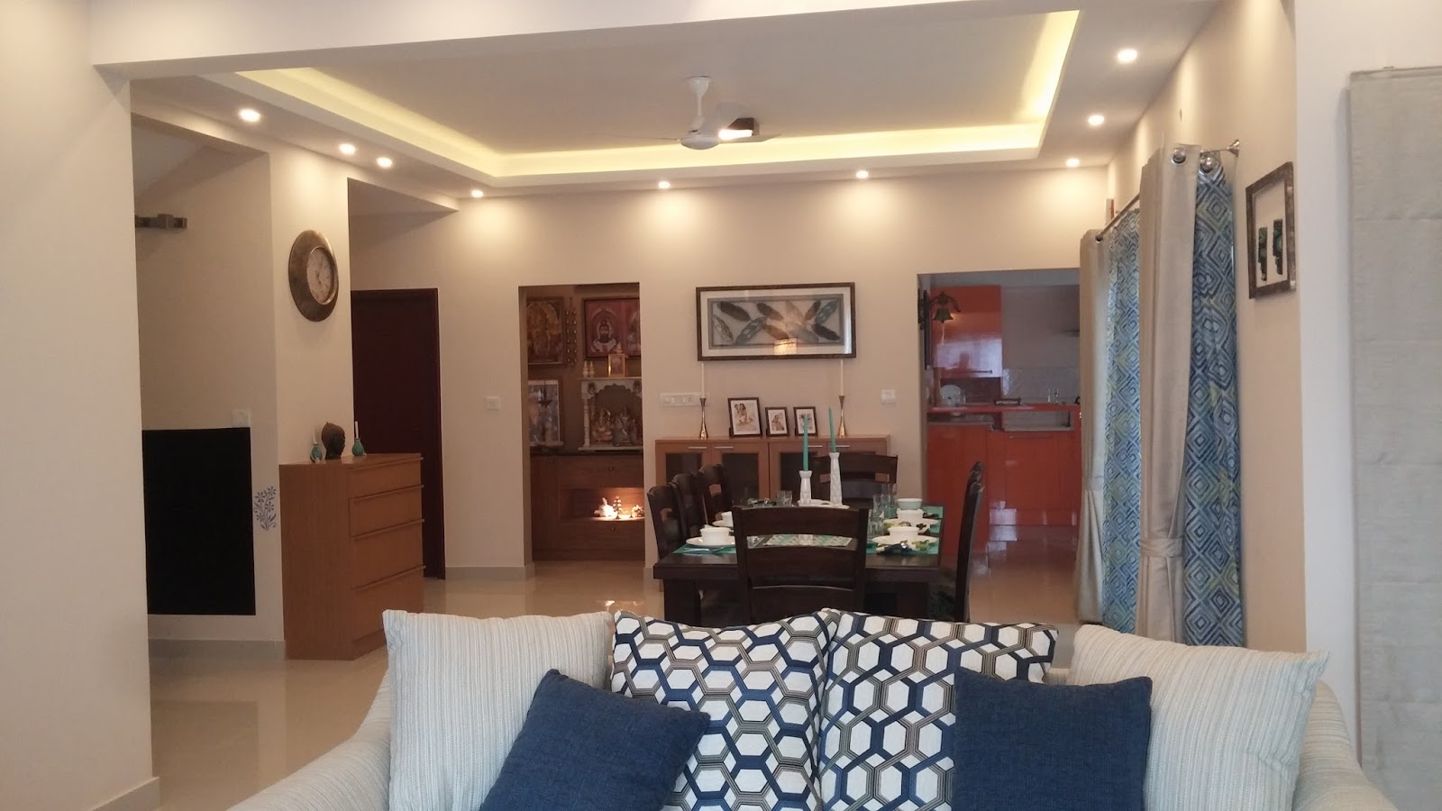 View of the dining room and lighting false roofing from the living area