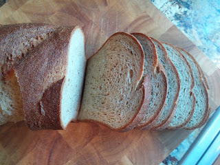 Dinner in the Life of a Dad—The BEST Low-Carb Bread Ever!!! Overhead picture of the baked loaf with a few sliced fanned out
