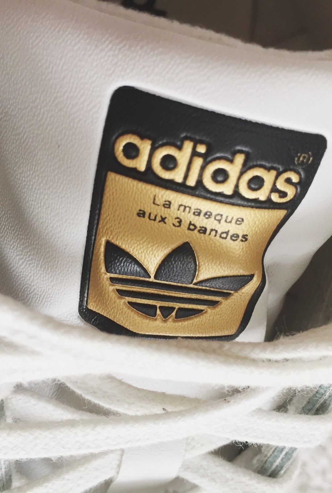 is the adidas logo on the left or right