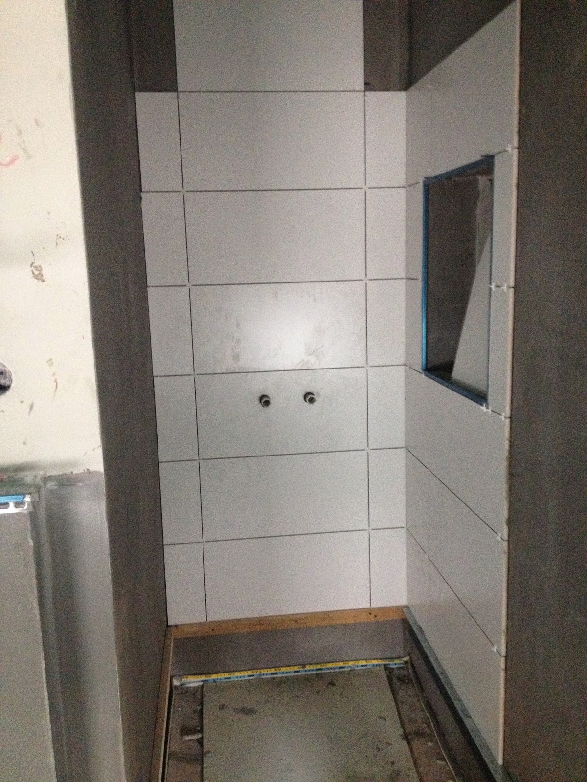 Projekt Hausbau Münchingen, Pensches bauen: 15.04.2014 - Fliesen im Bad