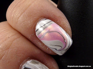 Pink, white and black water marble effect mani