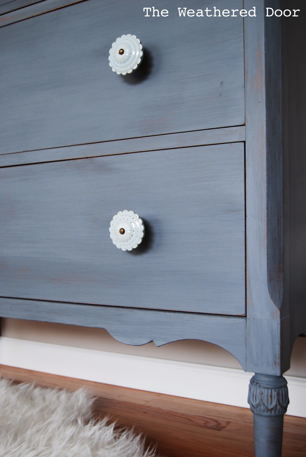 A Grey Blue Purple Dresser With Soft, Light Blue Dresser Knobs