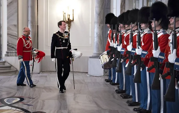 Crown Prince Frederik, Crown Princess Mary, Prince Jaochim and Princess Marie attend New Year's Banquet at Amalienborg Palace. Crown Princess Mary diamon tiara, Princess Marie diamond tiara, diamond earrings, Princess Mary wore diamond earrings wore satin govn and cape