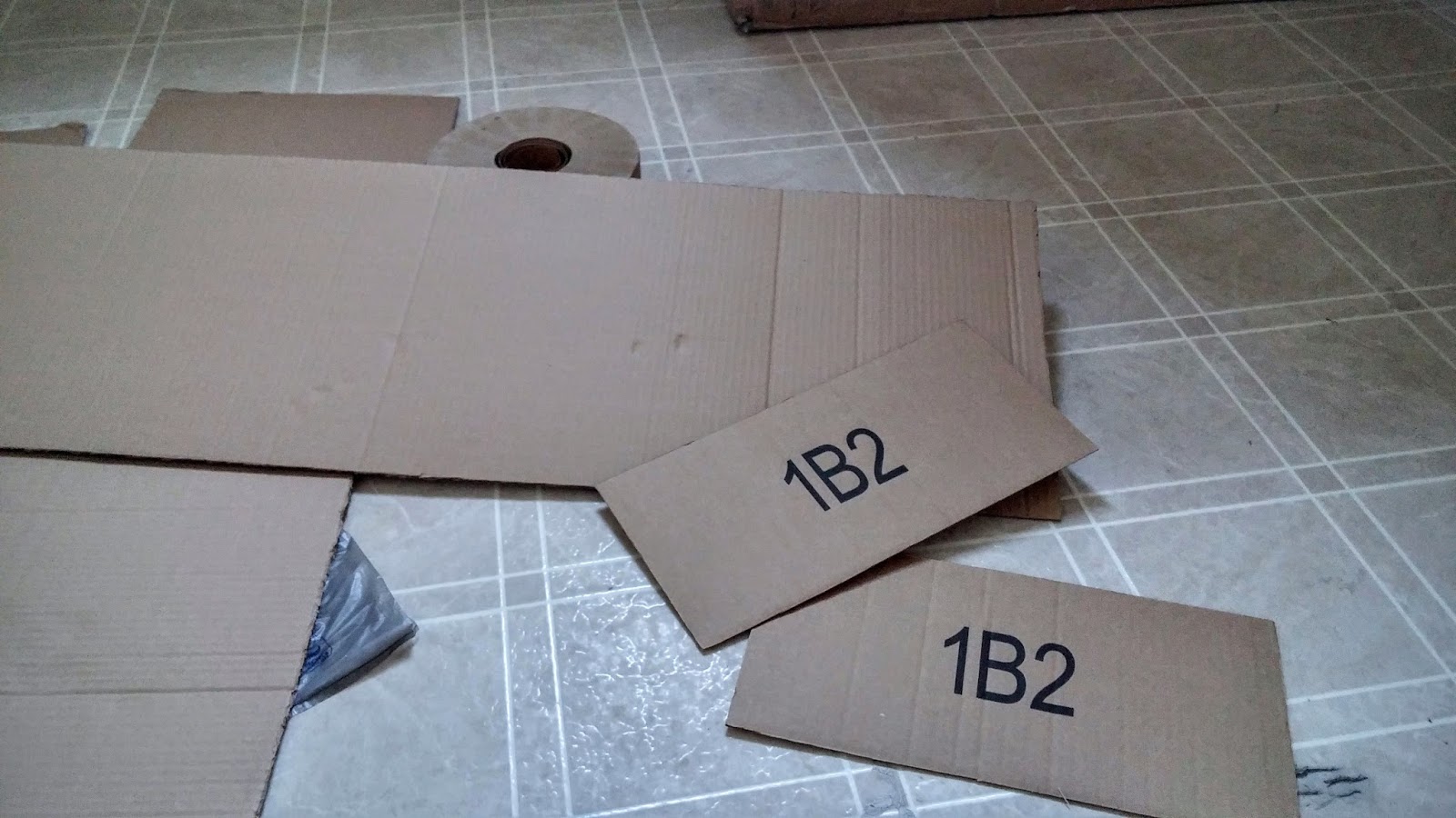 How to make a nice looking garbage can out of a cardboard box