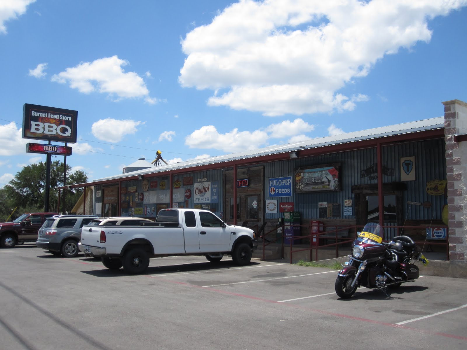 Man Up Tales of Texas BBQ™ Outside Feed Store BBQ TX)