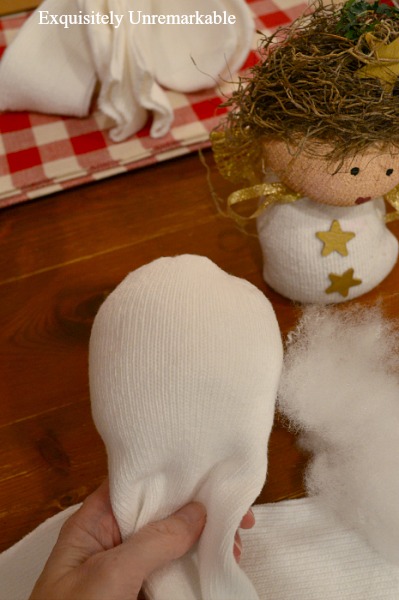 Stuffing A Sock To Make A Sock Snowman Or Angel
