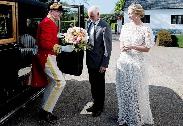 Princess Alexandra is wearing the Ahlefeldt-Laurvig-Bille floral tiara, wedding lace dress. Princess Nathalie and Princess Sumaya