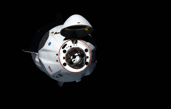 A snapshot of SpaceX's Endeavour capsule floating in the darkness of space...as seen from aboard the International Space Station on May 31, 2020. A snapshot of SpaceX's Endeavour capsule floating in the darkness of space...as seen from aboard the International Space Station on May 31, 2020.