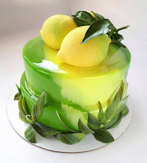 Glaze/Mirror Cake K'Mich Weddings - wedding planning - wedding cake ideas - lemon topper on yellow mirror glaze cake - instagram - on the day wedding planner
