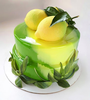 Glaze/Mirror Cake K'Mich Weddings - wedding planning - wedding cake ideas - lemon topper on yellow mirror glaze cake - instagram