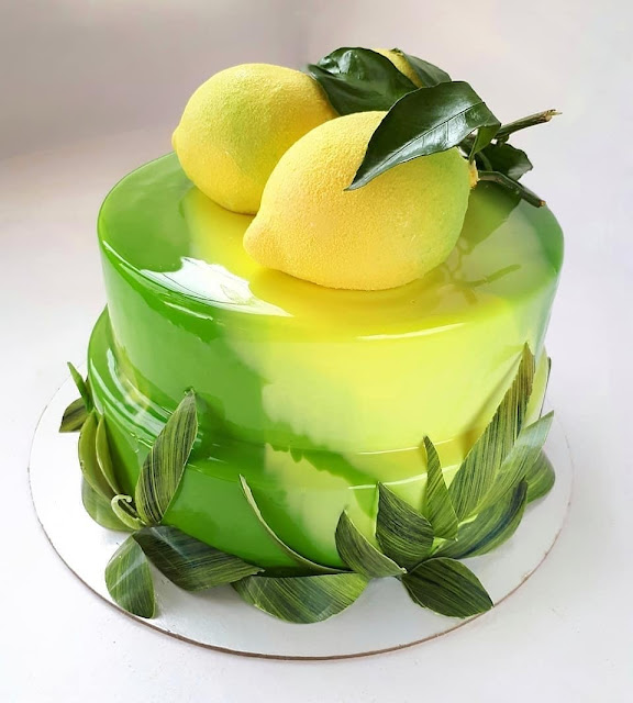 K'Mich Weddings - wedding planning - wedding cake ideas - lemon topper on yellow mirror glaze cake - instagram