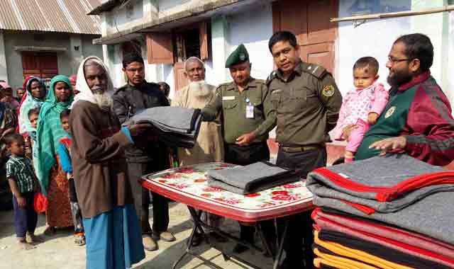 "Winters distributed among the destitute people at Kurigram Ansar-VDP “কুড়িগ্রামে আনসার-ভিডিপি উদ্দ্যোগে দুস্থদের মাঝে শীতবস্ত্র বিতরণ”