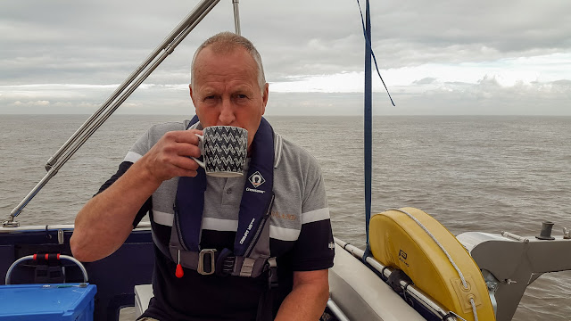 Phil enjoys his first cup of tea at sea on the aft deck Photo of Phil enjoying his first cup of tea at sea on the aft deck