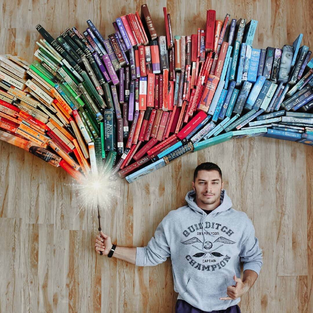 Guy Creatively Arranges His Huge Library of Books Into Artistic Scenes Guy Creatively Arranges His Huge Library of Books Into Artistic Scenes