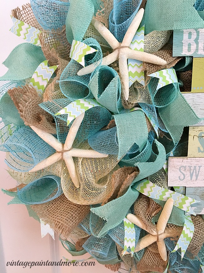 Vintage Paint and more... a beach themed deco mesh wreath made with colors of the sea and sand and rustic textures of the wharves