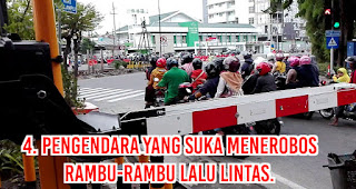 PENGENDARA YANG SUKA MENEROBOS RAMBU-RAMBU LALU LINTAS.