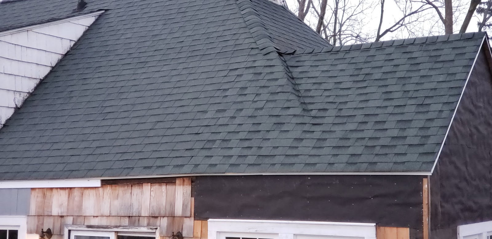 Gear Acres at Top of the Hill Shingles are on the New Roof