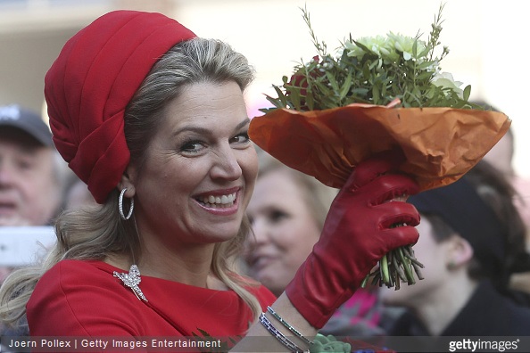 Queen Maxima of the Netherlands waves to the citizens at the town hall during her and King Willem-Alexander of the Netherlands state visit