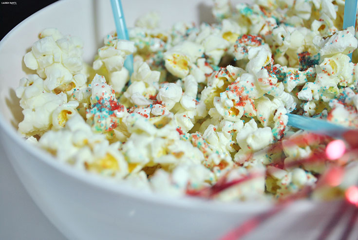 Fourth of July Firecracker Popcorn - This fun and festive treat is the perfect treat to eat while watching the fireworks!