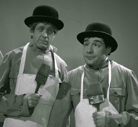 Vianello (left) with Ugo Tognazzi in a sketch from their 1950s satirical TV show Un due tre