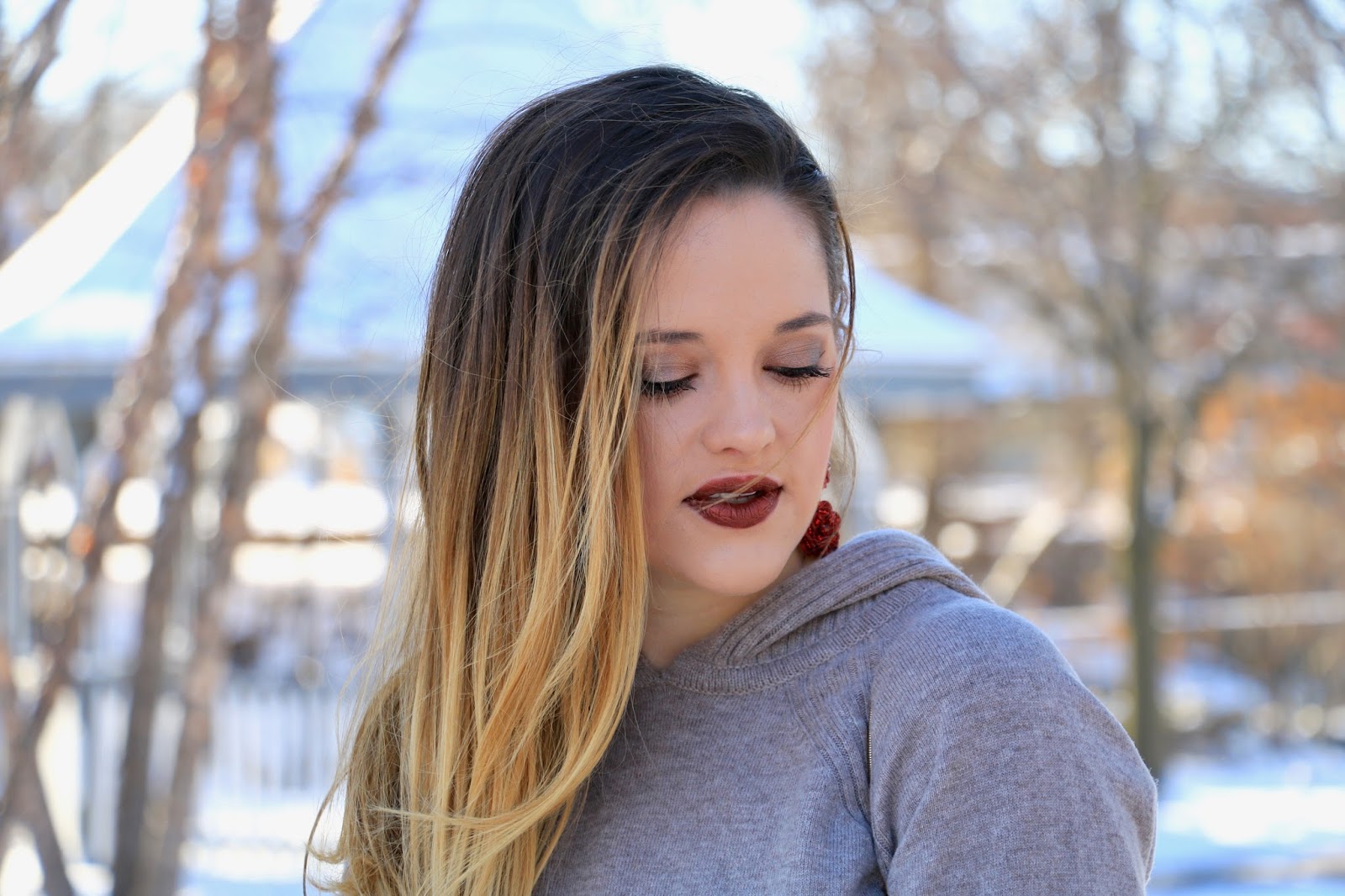 Nyc fashion blogger Kathleen Harper wearing Kylie Cosmetics metallic lip color in Reign