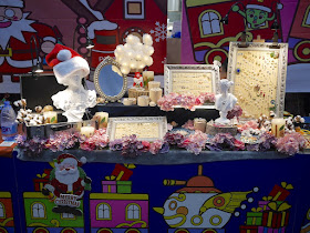 vendor stall with Santa-themed decorations