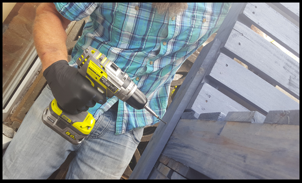 Ryobi tools being used to drill wood