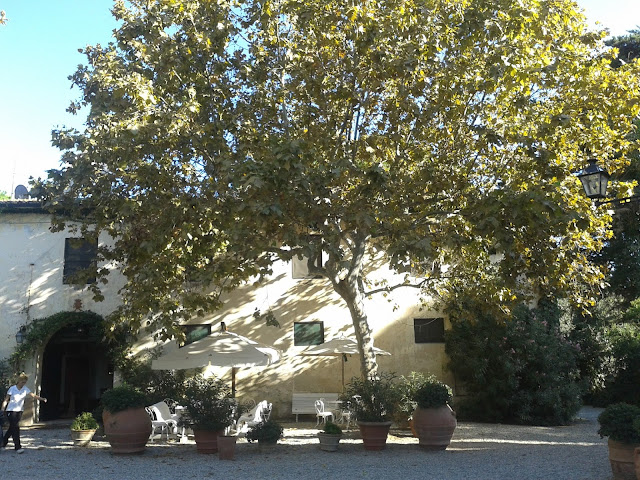The main building and garden of the La Parrina estate